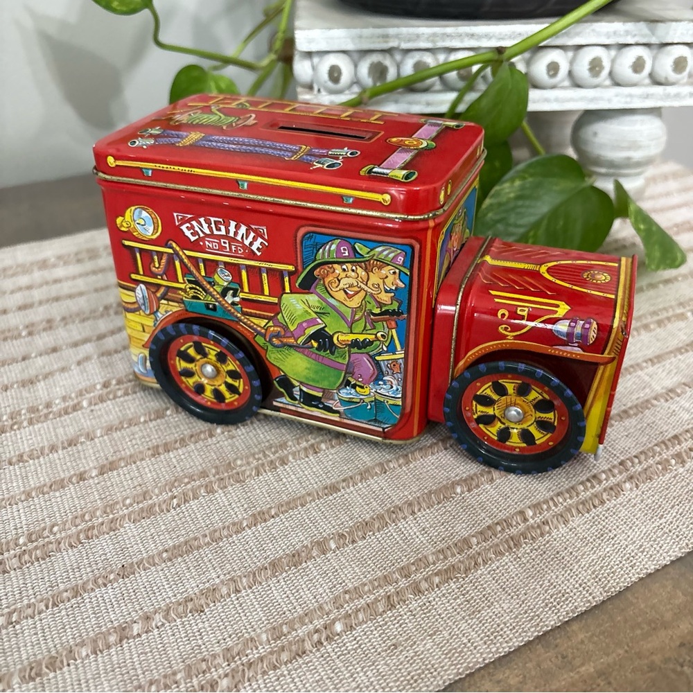 Vintage Fire Truck Bank- from part comes
Off main- Actually rolls around.